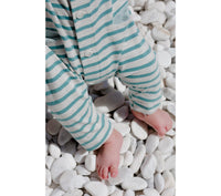 White and mint green striped romper playsuit for baby - up close of organic cotton material