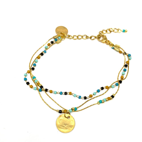 Gold and beaded layered style bracelet with chain 
