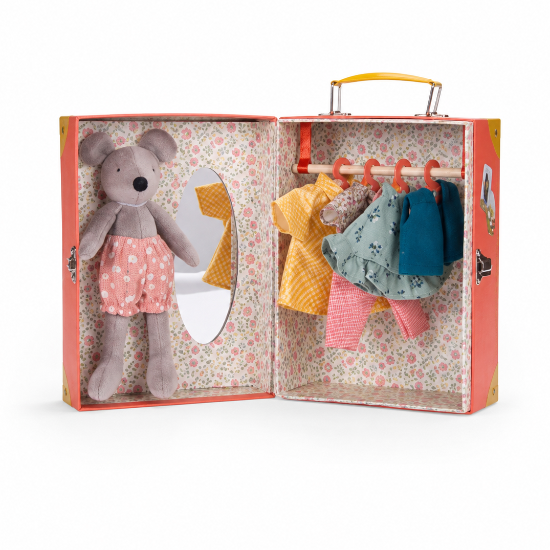 A children's play dress-up suitcase toy shown open on a white background. Inside, a plush gray mouse doll stands on the left, and a clothing rack on the right holds several colorful miniature outfits in yellow, blue, pink, and green.