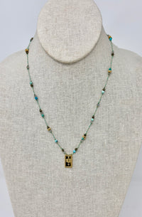 Baby Ubud Lotus Pyrite Turquoise Cord Necklace