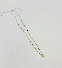 Baby Ubud Lotus Pyrite Turquoise Cord Necklace