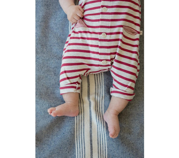 Red and white striped baby romper short sleved, close up of legs