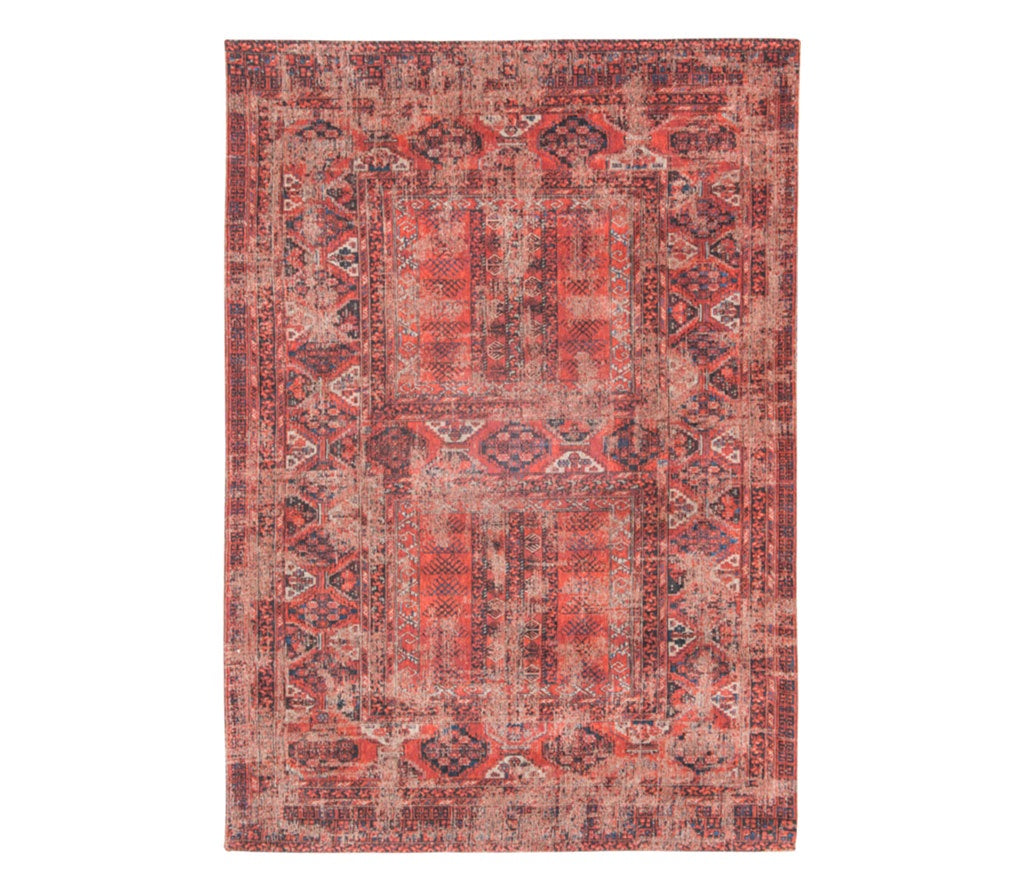 Full view of rich red tone distressed rug with antique pattern detail