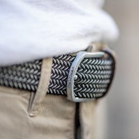 Braided belt in dark brown and white with brown leather detail with silver buckle