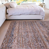 Earth tones moroccan nomad pattern rug. 