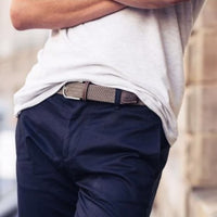 BILLYBELT grey taupe belt on model in blue trousers with white top